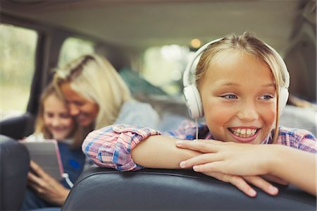 kids listening to music in car