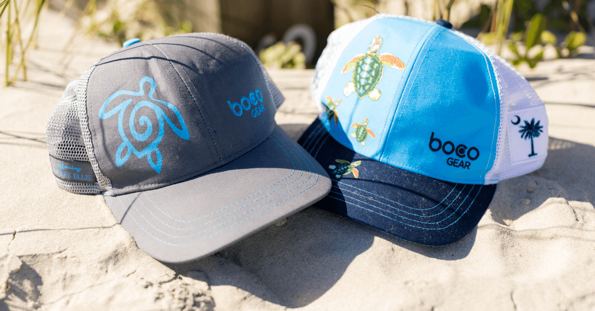 hats in sand with sea turtle design