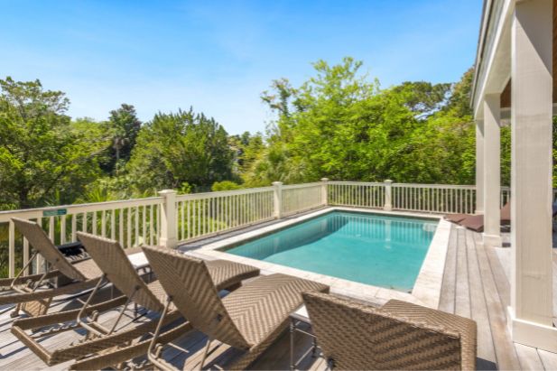 deck with pool and lounge chairs on kiawah island