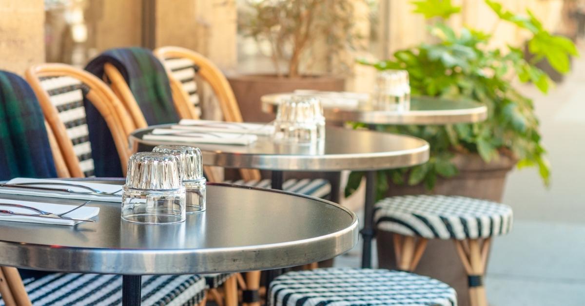 restaurant sidewalk with bistro tables